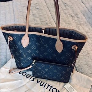 • L O U I S  V U I T T O N •